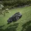 HUSQVARNA AUTOMOWER AWD mowing undulating ground and grass slopes